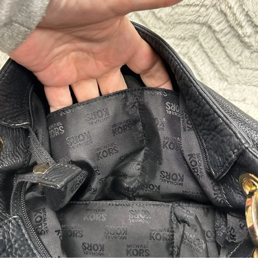 Michael Kors CrossBody Gold Chain Purse In Pebbled Black Leather.